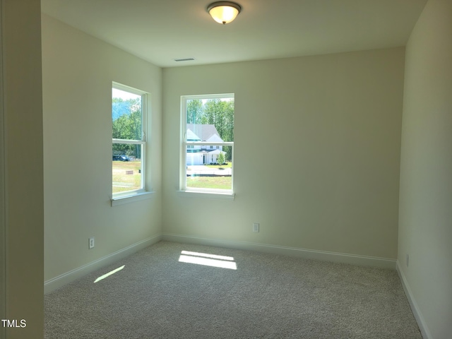 3703 Cessna Way Unit 9, Wilson, NC 27896 - unfurnished room featuring carpet flooring and baseboards
