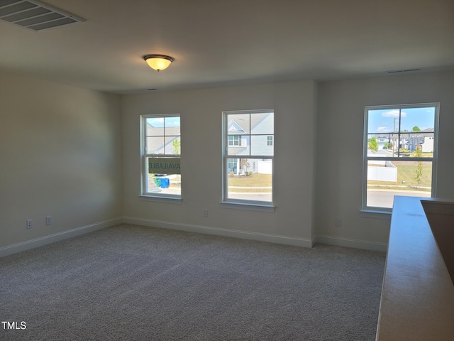 3703 Cessna Way Unit 9, Wilson, NC 27896 - unfurnished room with light colored carpet and baseboards