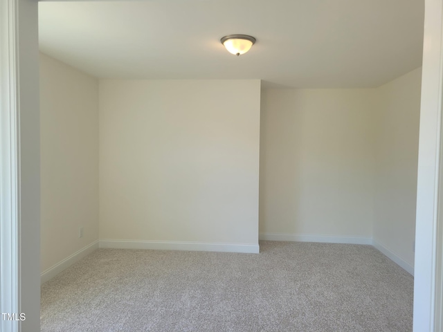 3703 Cessna Way Unit 9, Wilson, NC 27896 - carpeted spare room featuring baseboards