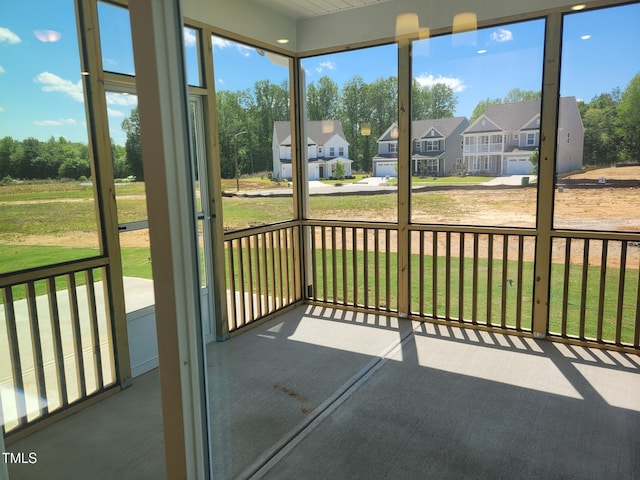 3703 Cessna Way Unit 9, Wilson, NC 27896 - unfurnished sunroom featuring a residential view