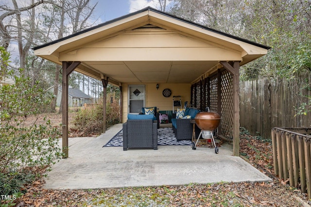 view of patio / terrace featuring fence and an outdoor living space