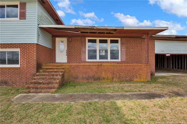 view of front of home with brick siding