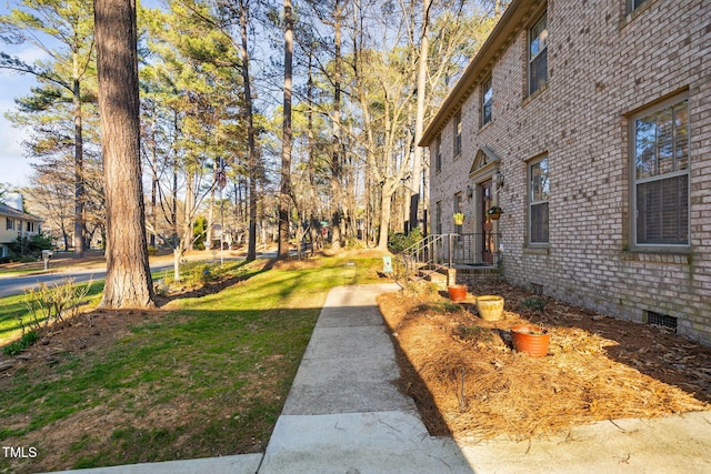 exterior space with a yard