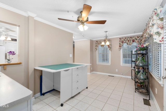 interior space featuring ornamental molding, light countertops, visible vents, and light tile patterned floors