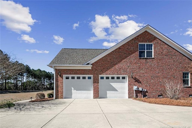 4305 Sanderosa Rd, Fayetteville, NC 28312 - view of side of property with driveway, a shingled roof, an attached garage, and brick siding