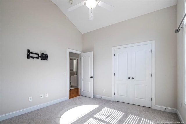 4305 Sanderosa Rd, Fayetteville, NC 28312 - unfurnished bedroom featuring high vaulted ceiling, a closet, light carpet, and baseboards