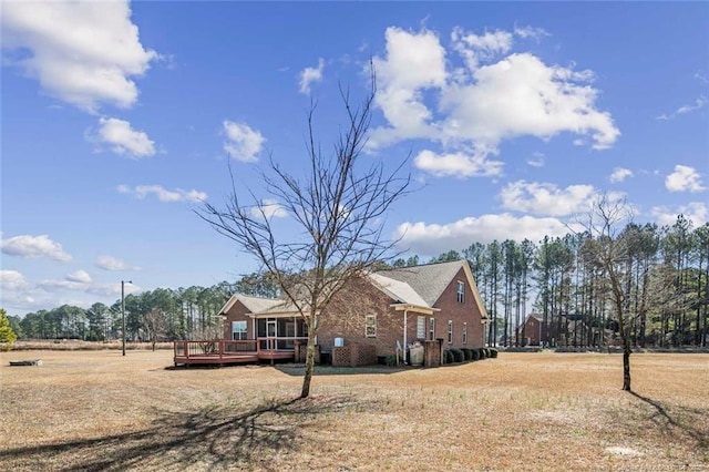4305 Sanderosa Rd, Fayetteville, NC 28312 - view of side of home featuring a wooden deck