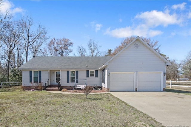 single story home with a garage, fence, concrete driveway, and a front yard