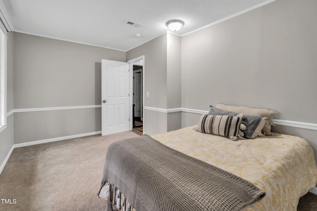 carpeted bedroom featuring visible vents, crown molding, a textured ceiling, and baseboards