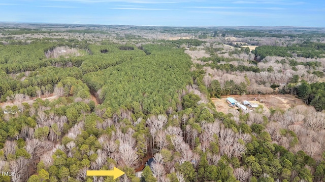 aerial view featuring a forest view