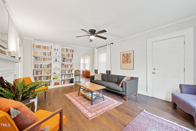 1209 Eva St, Durham, NC 27703 - living room featuring arched walkways, ceiling fan, ornamental molding, and wood finished floors