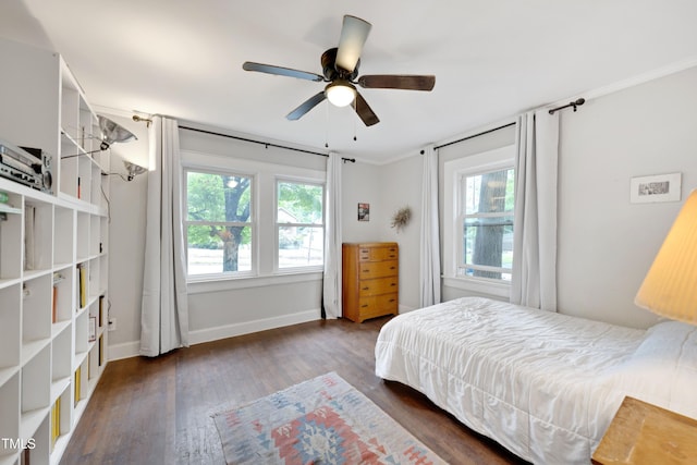 1209 Eva St, Durham, NC 27703 - bedroom featuring wood finished floors, baseboards, and ceiling fan