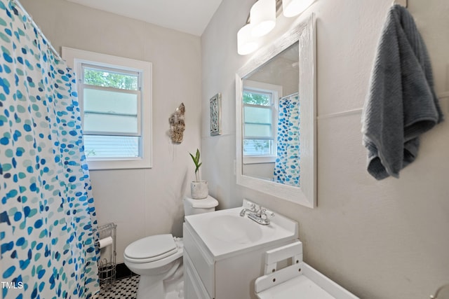 1209 Eva St, Durham, NC 27703 - full bath featuring toilet, vanity, and curtained shower