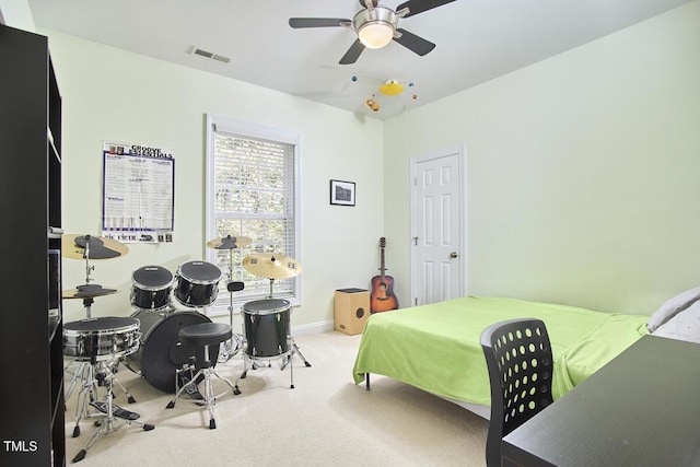 bedroom featuring carpet, visible vents, baseboards, and ceiling fan