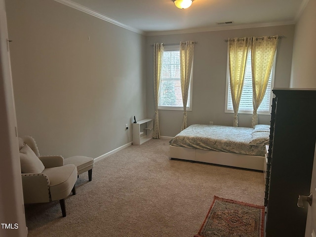 carpeted bedroom with baseboards, visible vents, and ornamental molding