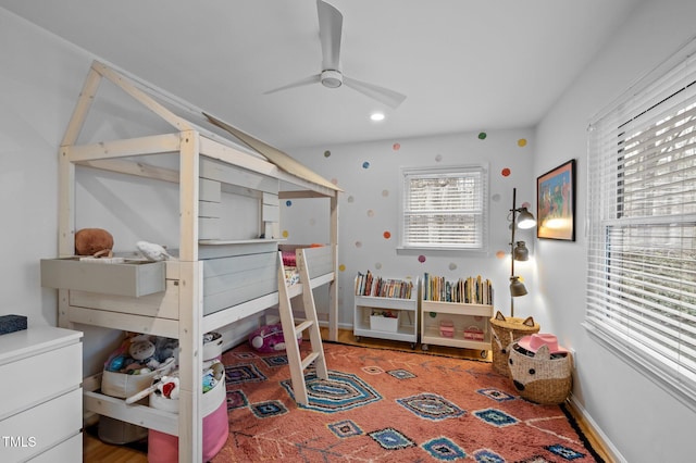 bedroom featuring baseboards