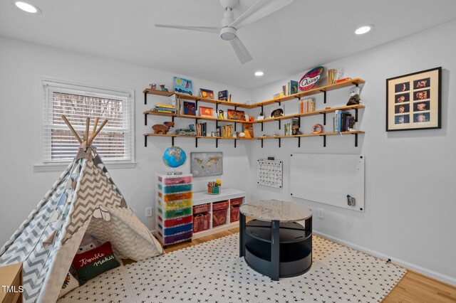 playroom with light wood finished floors, recessed lighting, baseboards, and ceiling fan