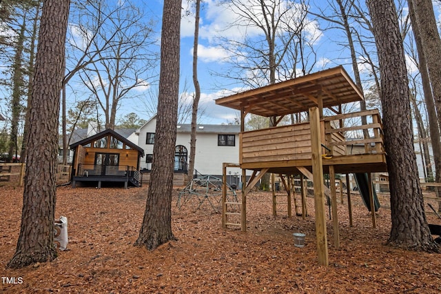 view of yard with a wooden deck