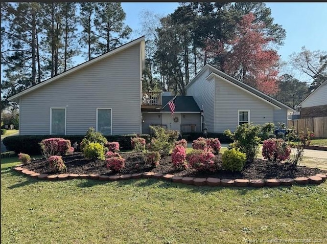 view of home's exterior with a lawn