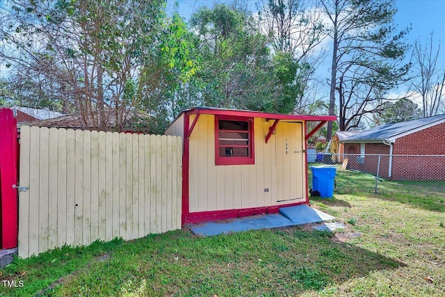 view of shed featuring a fenced backyard