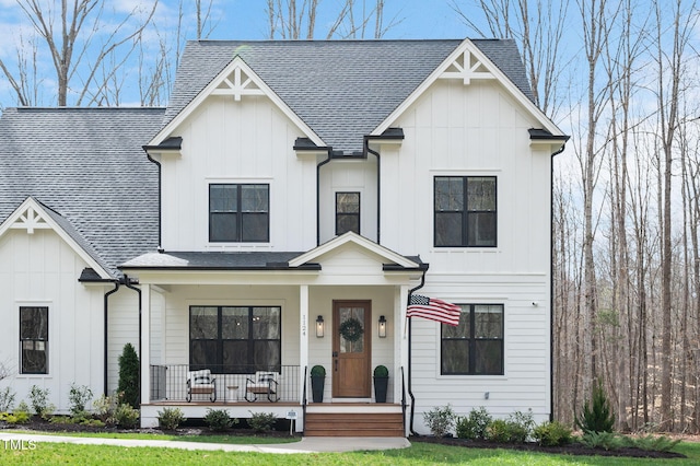 1124 Westridge Rd, Rougemont, NC 27572 - modern inspired farmhouse featuring board and batten siding, covered porch, and a shingled roof