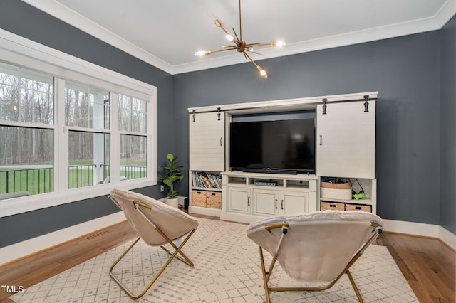 1124 Westridge Rd, Rougemont, NC 27572 - living room with visible vents, wood finished floors, an inviting chandelier, crown molding, and baseboards