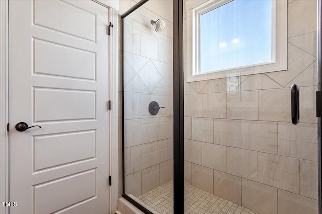 bathroom with a stall shower