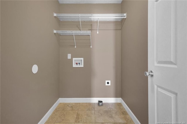 laundry area featuring hookup for a washing machine, laundry area, hookup for an electric dryer, and baseboards