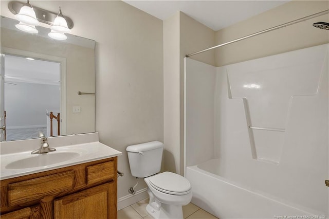 bathroom featuring baseboards, toilet, shower / tub combination, tile patterned flooring, and vanity