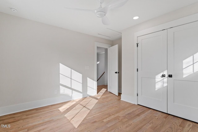 interior space featuring recessed lighting, light wood-type flooring, and baseboards