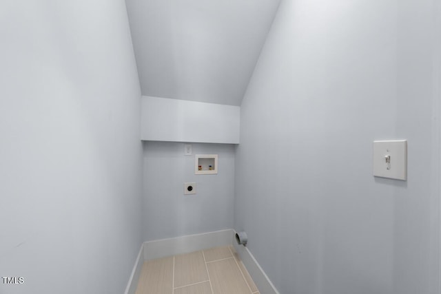 clothes washing area featuring electric dryer hookup, laundry area, baseboards, and hookup for a washing machine
