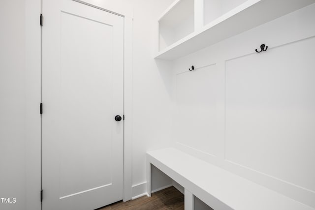 mudroom with dark wood-style floors