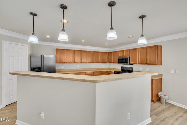 kitchen featuring stainless steel appliances, light wood-type flooring, and crown molding