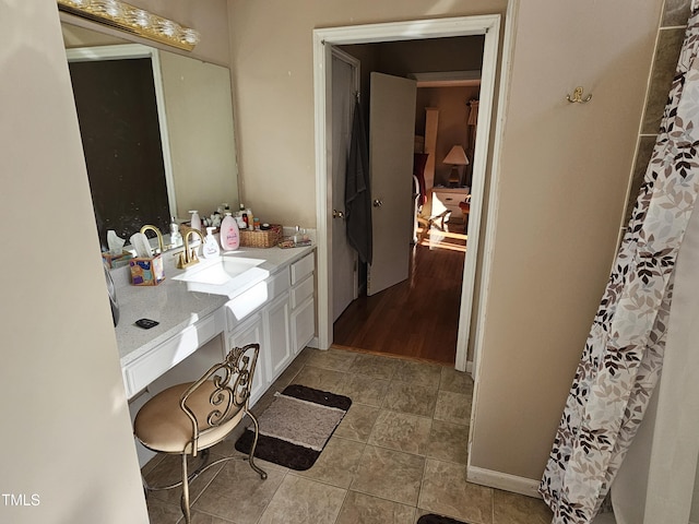 bathroom with vanity and a shower with curtain