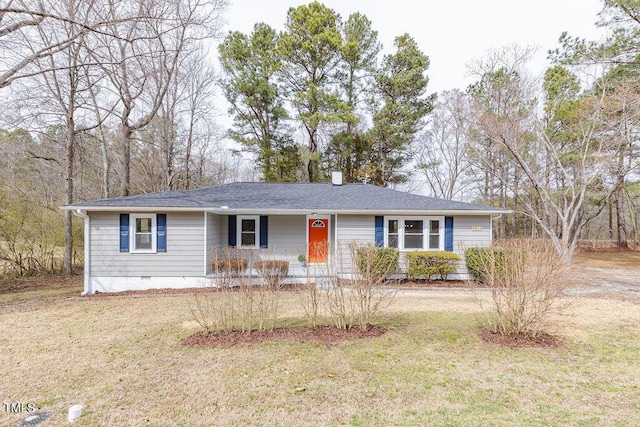 ranch-style house with a shingled roof, crawl space, and a front lawn