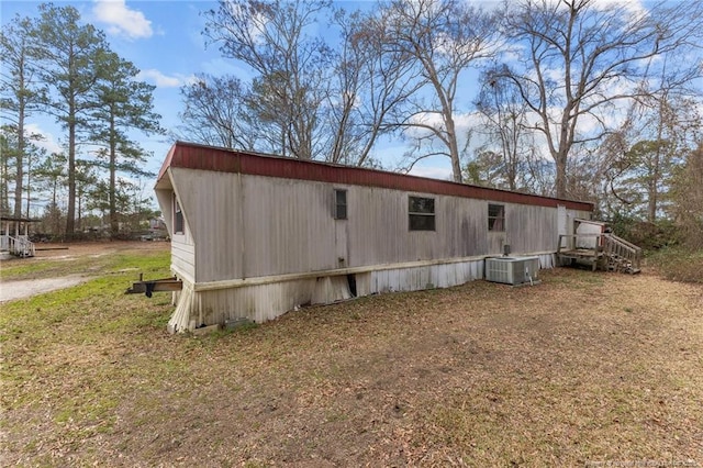 view of home's exterior featuring cooling unit