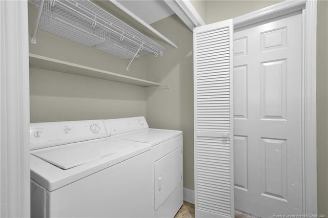 laundry area featuring washer and clothes dryer