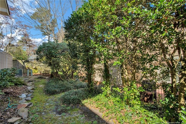 view of yard featuring fence