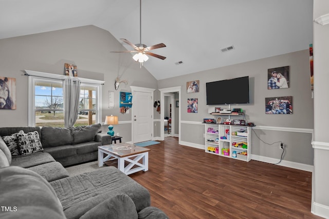 living room with ceiling fan, wood finished floors, visible vents, and baseboards