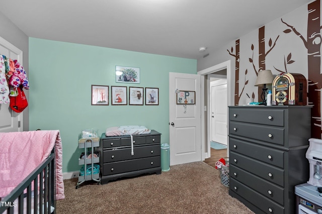 bedroom featuring carpet