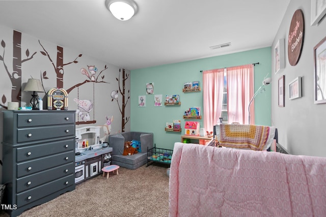 carpeted bedroom featuring visible vents