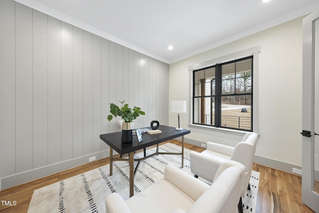 office area featuring light wood-style flooring, ornamental molding, baseboards, and recessed lighting