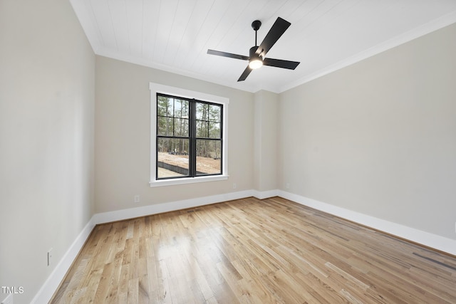 unfurnished room featuring baseboards, a ceiling fan, wood ceiling, ornamental molding, and light wood-type flooring