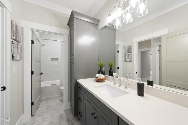 full bathroom featuring ornamental molding, shower / tub combination, vanity, and toilet