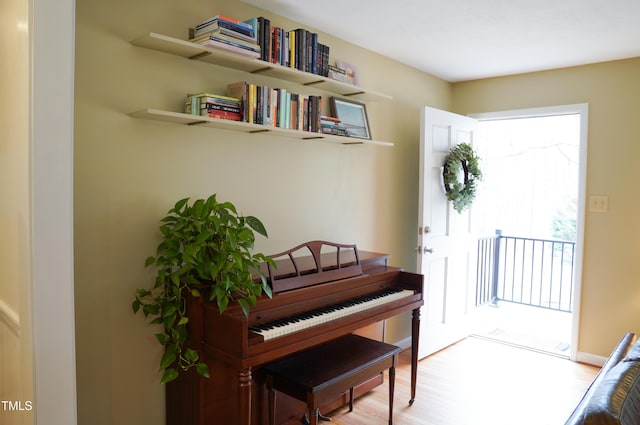 sitting room featuring wood finished floors and baseboards