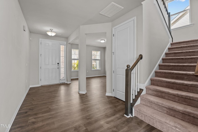 717 Tailrace Falls Ct, Wake Forest, NC 27587 - foyer with dark wood-style floors, stairs, and baseboards