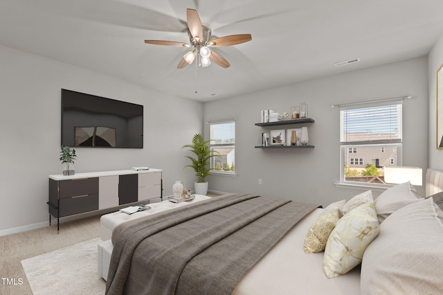 717 Tailrace Falls Ct, Wake Forest, NC 27587 - bedroom featuring light carpet, ceiling fan, and baseboards