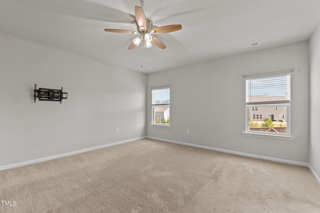 717 Tailrace Falls Ct, Wake Forest, NC 27587 - carpeted empty room with baseboards and ceiling fan