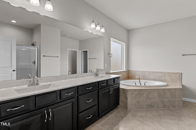 717 Tailrace Falls Ct, Wake Forest, NC 27587 - bathroom featuring a shower stall, tile patterned floors, double vanity, and a bath