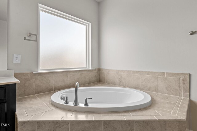 717 Tailrace Falls Ct, Wake Forest, NC 27587 - full bath featuring vanity and a garden tub